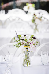 a beautiful table setting at an outdoor cafe