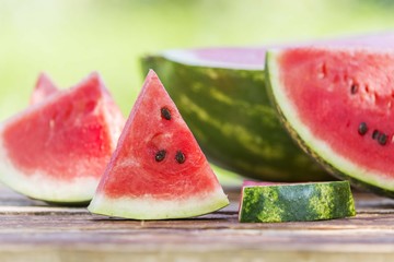 Sliced watermelon fruit on wooden table. watermelon slice
