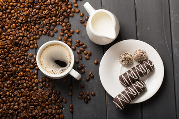 black coffee beans on black background