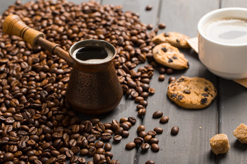 black coffee beans on black background