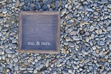 A wooden box frame for the mr and mrs of the new wedding. 