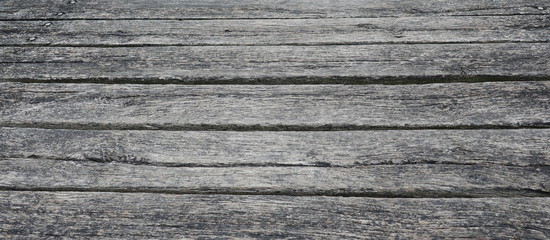 Alte verwitterte Holzplanken am Hafen. Nahaufnahme