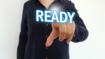 Businesswoman pointing finger on ready text