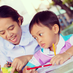 Mother is teaching her son