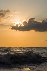 Amazing sea sunset, the sun, waves, clouds