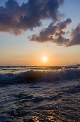 Amazing sea sunset, the sun, waves, clouds
