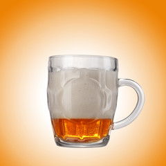beer mug with beer on a yellow background