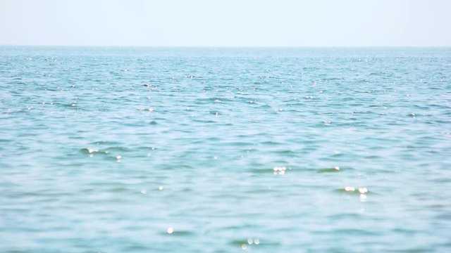 Tranquil sea background. Sea or ocean water and clear sly, close up.