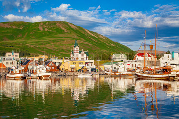 Historic fishing town of Husavik at sunset, Iceland - obrazy, fototapety, plakaty