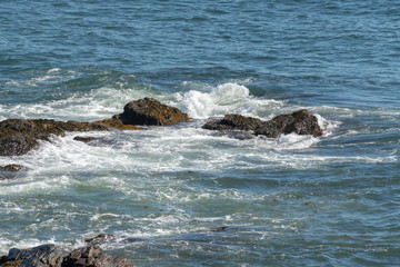 Rocks in Ocean with seawash