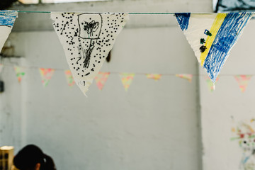 Pennants painted by children to play in summer