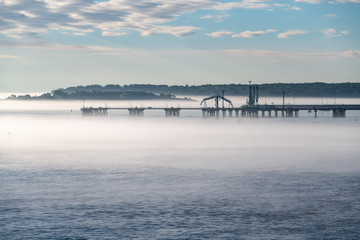 Fototapeta na wymiar Pier in the Fog in Maine
