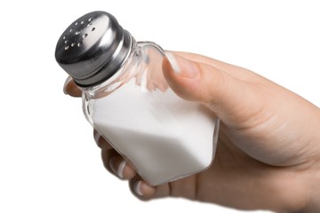 Hand Holding a Salt Shaker