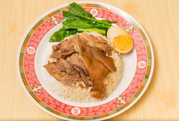 Stewed pork leg on rice with boiled egg, Traditional food in Thailand.