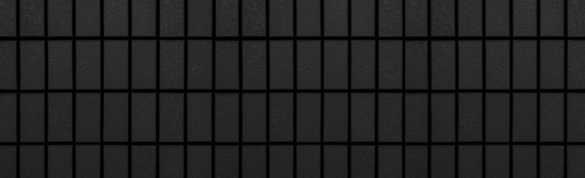 Panorama of Black brick wall pattern and seamless background