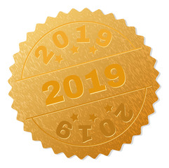 2019 gold stamp seal. Vector golden medal of 2019 text. Text labels are placed between parallel lines and on circle. Golden surface has metallic texture.