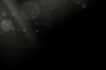 White glares bokeh on a black background. Rays light side. Light effect for your design. White spot. Flying lights.Vector illustration