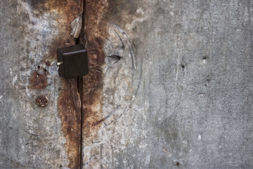Photo of rust locked metal doors and keylock
