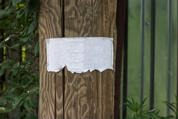 Photo of paper banner on wooden column