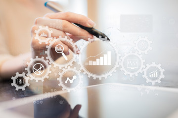 Big data analytics. BI business intelligence concept with chart and graph icons on virtual screen.