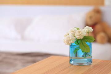 White jasmine flowers in a glass.Beautiful jasmine flower in the pot on the bedroom.