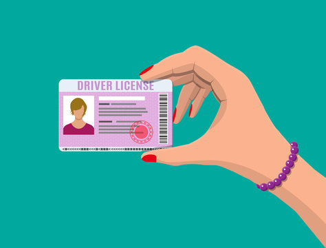 Car driver woman license in hand