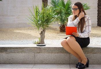 Office woman working with tablet in the outdoors