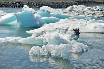 Icebergs formed as a result of sliding the glacier into a huge lake. Iceland. Jokulsarlon.