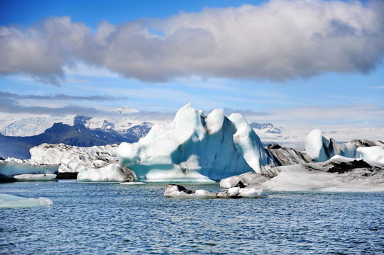 Icebergs formed as a result of sliding the glacier into a huge lake. Iceland. Jokulsarlon.