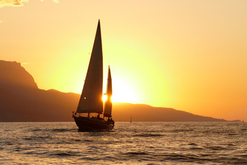 Fototapeta na wymiar sailing regatta at sunset