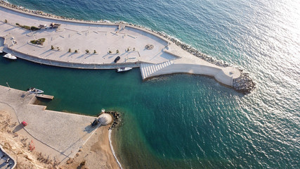 Aerial drone photo of famous resort in Cavo Tagoo famous for number of pools in new public port of Mykonos island, Cyclades, Greece
