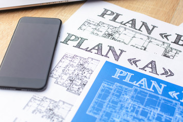 Fototapeta premium Architectural blueprints - paper, drawings, pencil, plan, layout, ruler, calculator, compasses