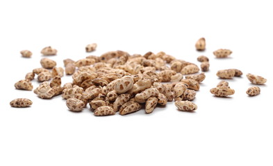 Organic barley flakes, pile isolated on white background