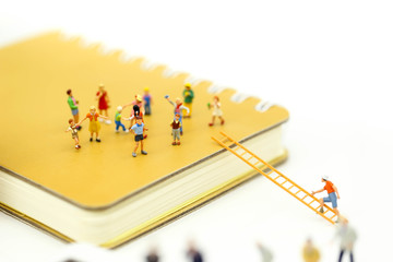 Miniature people : Group childrens are playing together on playground.