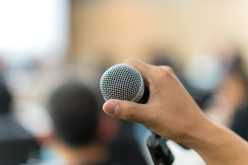 hand hold Microphone in meeting room for a conference