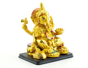 Gilded figure of the elephant Ganesha on white background