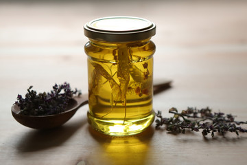 Jar of jam from the petals of the Linden tree of bright yellow