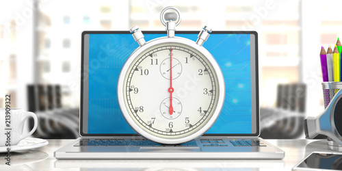 stopwatch timer on computer laptop blur office business