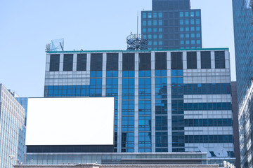 Blank billboard or advertising poster on the building wall mock up, for advertisement concept background