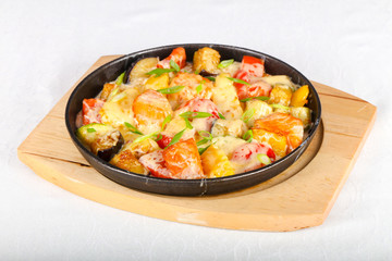 Baked salmon with potato in pan