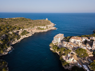 Aerial: Houses on the shore in Cala Figuera, Mallorca, Spain