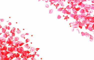 Flowers background. Frame of petals pattern of pink roses and red hearts  on a white background. top view.copy 