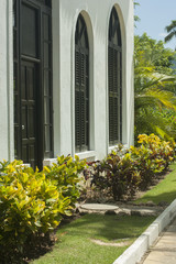 Main entrance of residential house with concrete pavement and doorsteps