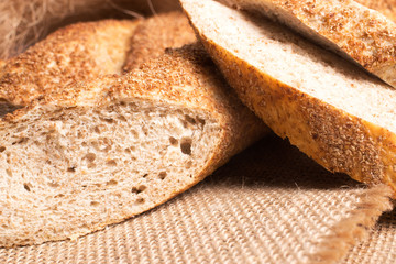 Fresh sliced ​​bread on burlap.