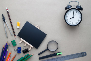 Creative flat lay back to school concept with stationary on workspace desk