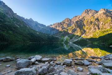 Fototapeta na wymiar beautiful lake Morskie Oko in the Tatras in Poland in the shadow of the mountains