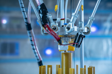 Print parts on a delta 3D printer in industrial lab