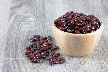 Red bean in wood bowl placed on the wooden table