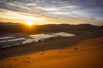 Fototapeta na wymiar Sunrise in the Namib desert in Namibia