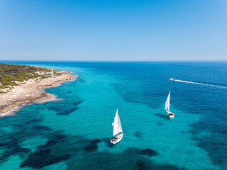 Aerial: Cape Ses Salines lighthouse in Mallorca